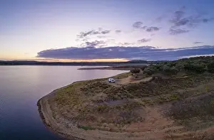 Reflection Lake Prints: Drone panoramic aerial view of a camper van living vanlife at Minutos Dam in Arraiolos Alentejo at sunset