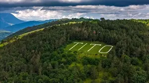 Green Valley Prints: Drone Perspective of Lush Green Hills and Vineyards in Vipava Valley