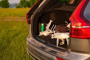 Videography Prints: drone ready for fly in suv trunk landscape nature mountains sunset