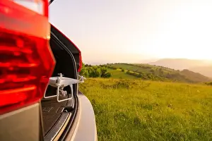 Videography Prints: drone ready for fly in suv trunk landscape nature mountains sunset