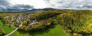 A drone rises above a multi-colored valley in the Vosges