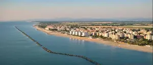 Drone shot of Adriatic shoreline.Summer vacation concept.Lido Adriano town, Adriatic coast, Emilia Romagna, Italy