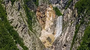 Crystal Clear Prints: Drone Shot Capturing the Beauty of Boka Waterfall in Slovenia