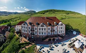 Siding Prints: Drone view of an ancient castle used for weddings and celebrations