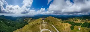 Drone top view Buzludzha - abandoned communist building in the Balkan mountains, Bulgaria. UFO dish look a like