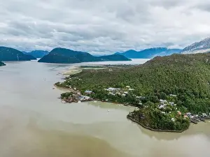 Drone view of Caleta Tortel with its small cabins - Discovering the beautiful village while traveling the Carretera