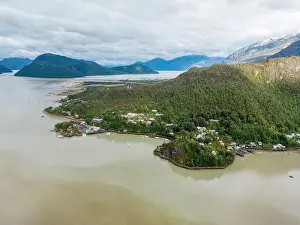 Drone view of Caleta Tortel with its small cabins - Discovering the beautiful village while traveling the Carretera