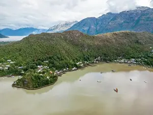 Caleta Tortel Prints: Drone view of Caleta Tortel with its small cabins - Discovering the beautiful village while traveling the Carretera