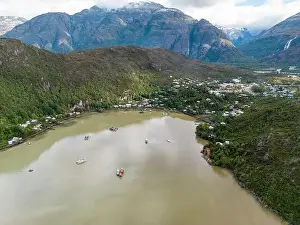 Caleta Tortel Prints: Drone view of Caleta Tortel with its small cabins - Discovering the beautiful village while traveling the Carretera