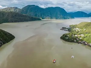 Caleta Tortel Prints: Drone view of Caleta Tortel with its small cabins - Discovering the beautiful village while traveling the Carretera