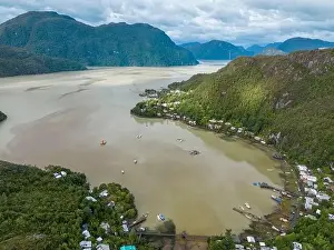 Caleta Tortel Prints: Drone view of Caleta Tortel with its small cabins - Discovering the beautiful village while traveling the Carretera
