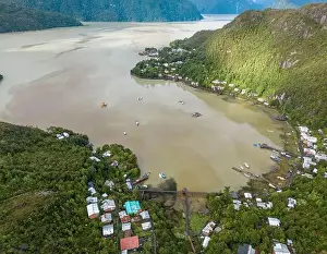 Caleta Tortel Prints: Drone view of Caleta Tortel with its small cabins - Discovering the beautiful village while traveling the Carretera