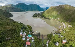 Patagonia Prints: Drone view of Caleta Tortel with its small cabins - Discovering the beautiful village while traveling the Carretera