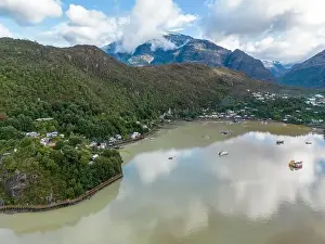Caleta Tortel Prints: Drone view of Caleta Tortel with its small cabins - Discovering the beautiful village while traveling the Carretera