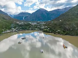 Caleta Tortel Prints: Drone view of Caleta Tortel with its small cabins - Discovering the beautiful village while traveling the Carretera
