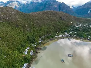Caleta Tortel Prints: Drone view of Caleta Tortel with its small cabins - Discovering the beautiful village while traveling the Carretera