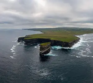 Sea Stack Prints: A drone view of the Downpatrick Head sea stack and cliffs and coastline of northern County Mayo in Ireland