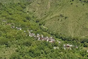 Sichuan Prints: Drone view of green highlands located in hilly terrain with national religious constructions of Sichuan province