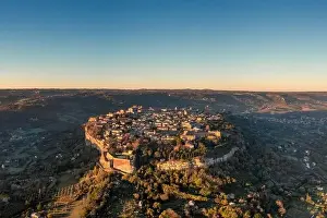 Butte Prints: Drone view of the historic clifftop city of Orvieto in Italy at sunrise