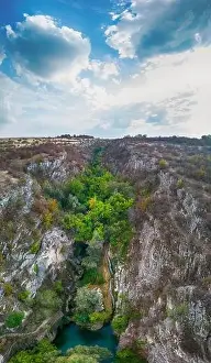Drone view at Hotnishki Waterfall near Veliko Tarnovo during summer with great acqua colors