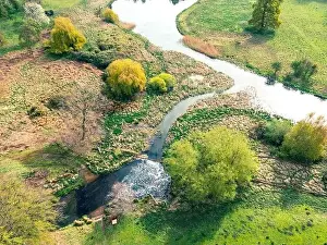 River Bank Prints: Drone view of marsh and a fresh inland water way famous for salmon