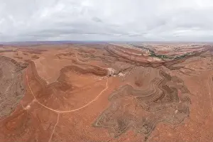 Geological Formation Prints: Drone view of meandering Rio San Juan cutting through the rugged landscapes of San Juan Canyon near Mexican Hat