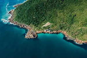 Holiday Beach Prints: Drone view of rocky coastline with blue Atlantic ocean in Brazil