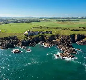 Drone view of Slains Castle and the wild coast of Aberdeenshire