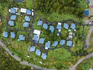 Caleta Tortel Prints: Drone view of Tortel with its small cabins - Discovering the beautiful village while traveling the Carretera Austral