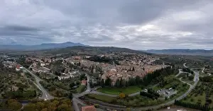 Smalltown Prints: Drone view of the Tuscan hilltop village and viticulture town of San Quirico d'Orcia