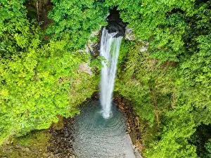 Cold Water Prints: Drone view of water cascade in Katibawasan Falls. Camiguin Island. Philippines