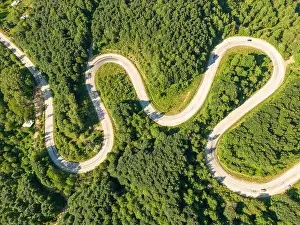 Bent Prints: Drone view of the winding road from Domanic Town of Kutahya to Inegol direction
