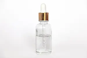 Aromatherapy Prints: Dropper glass Bottle Mock-Up wth hyaluronic acid on white background, beauty serum