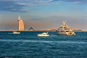 Dubai city - amazing city center skyline and famous Jumeirah beach at sunset, United Arab Emirates