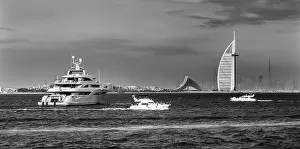 Jumeirah Beach Prints: Dubai city - amazing city center skyline and famous Jumeirah beach at sunset