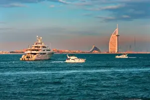 Dubai city - amazing city center skyline and famous Jumeirah beach at sunset, United Arab Emirates
