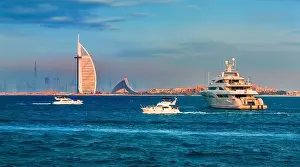 Dubai city - amazing city center skyline and famous Jumeirah beach at sunset, United Arab Emirates
