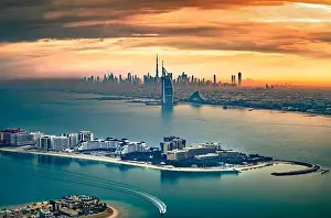 Dubai city - amazing city center skyline and famous Jumeirah beach at sunset, United Arab Emirates