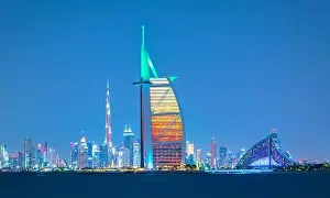 Dubai city - amazing city center skyline and famous Jumeirah beach at sunset, United Arab Emirates