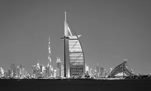 Dubai city - amazing city center skyline and famous Jumeirah beach at sunset, United Arab Emirates