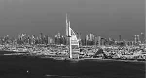 Dubai city - amazing city center skyline and famous Jumeirah beach at sunset, United Arab Emirates