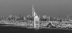 Dubai city - amazing city center skyline and famous Jumeirah beach at sunset, United Arab Emirates