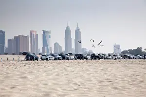 Emirate Prints: DUBAI, UAE - FEBRUARY 2018: A view of Dubai skyscrapers from black palace public beach