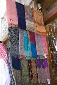 United Arab Emirates Prints: Dubai United Arab Emirates A colourful selection of Pashmina shawls for sale imported from India