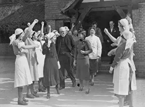 1940 Prints: Duchess Of Gloucester Visits Maternity Hospital: Nurses cheering as the Duchess of Gloucester left