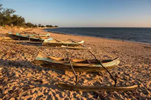Non Urban Scene Prints: Dugout canoes used as fishing boats on Ifaty Beach at sunset
