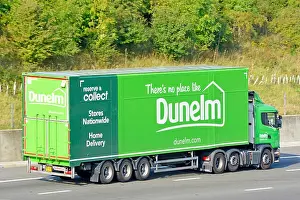 Dunelm lorry and trailer driving along motorway with advertising including reserve & collect facility
