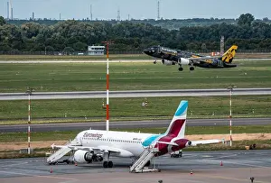 Taxiway Prints: Düsseldorf Airport, Eurowings aircraft taking off