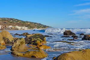 Crashing Prints: Dynamic waves crashing against rugged rocks at Malibu Beach