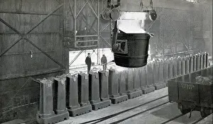Lake Michigan Prints: This early 1900s photo shows an Inland Steel company workers at the process of pouring the ingots